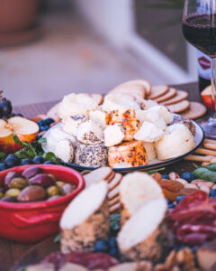 Hanini Gbejniet, wine, olives, salami. A great cheese board!